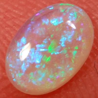 SOLID CRYSTAL OPAL Bright green fire in a 3 dimensional pattern